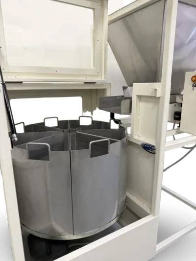 Close up of stainless steel dividing containers on RSD 8x25 litre rotary sample divider