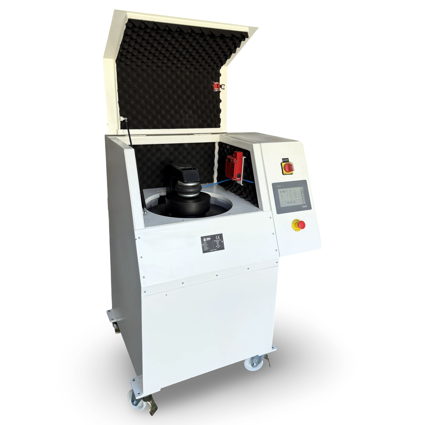 Unal HO-1500 vibratory disc mill with lid open, showing pneumatic clamping mechanism, grinding bowl and acoustic-lined enclosure