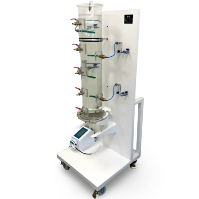 Side view of the ÜNAL heap leaching simulation column with transparent PMMA body, sampling valves and aeration system