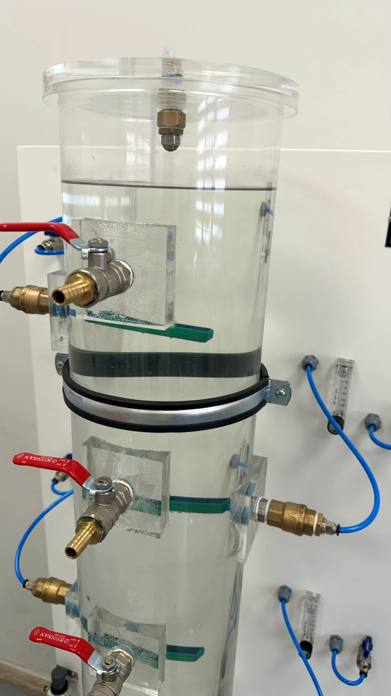 Upper solution distribution nozzle, sampling valves and air connections of the heap leaching simulation column